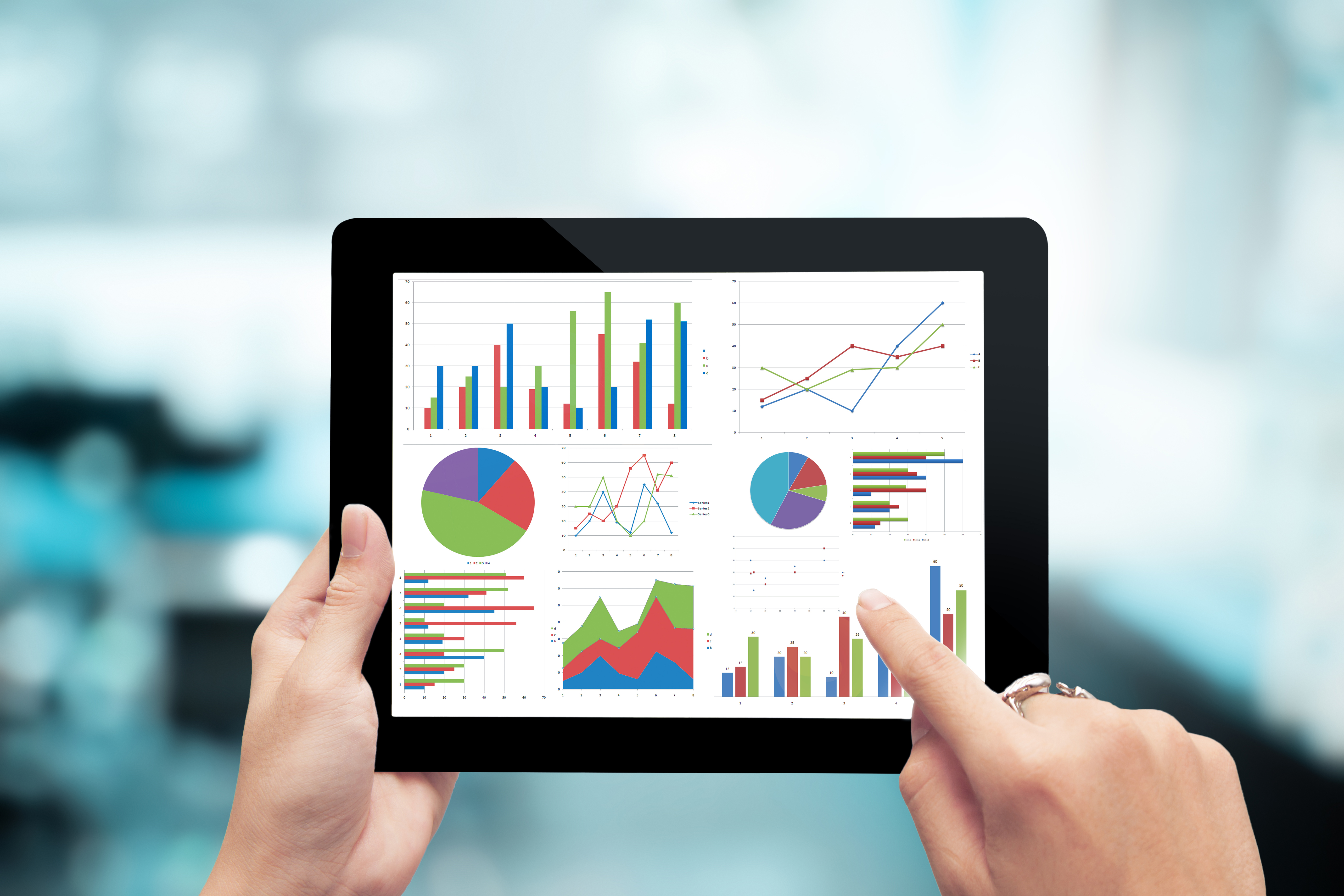 Business analytics dashboard on a tablet